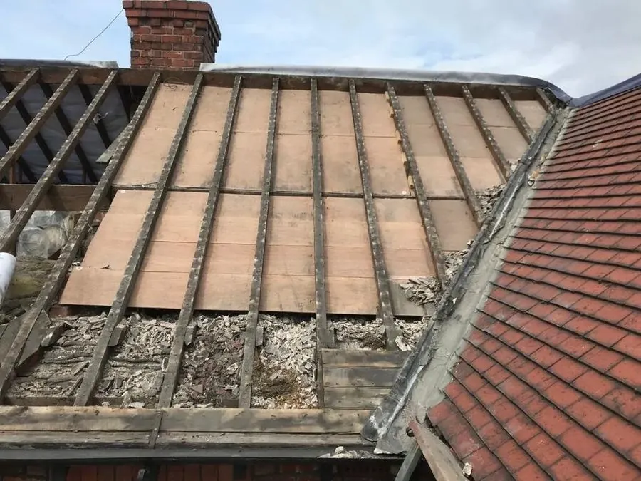 Full re-roofing in progress